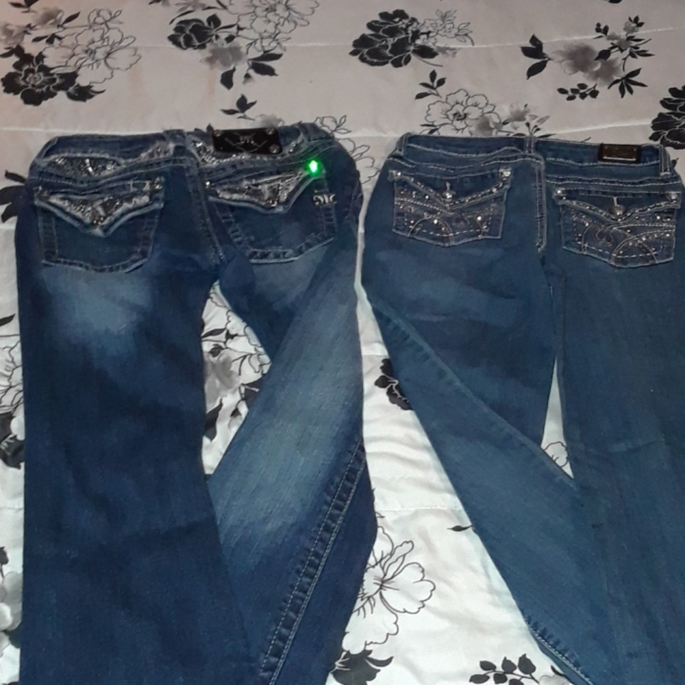 Two designer denim jeans